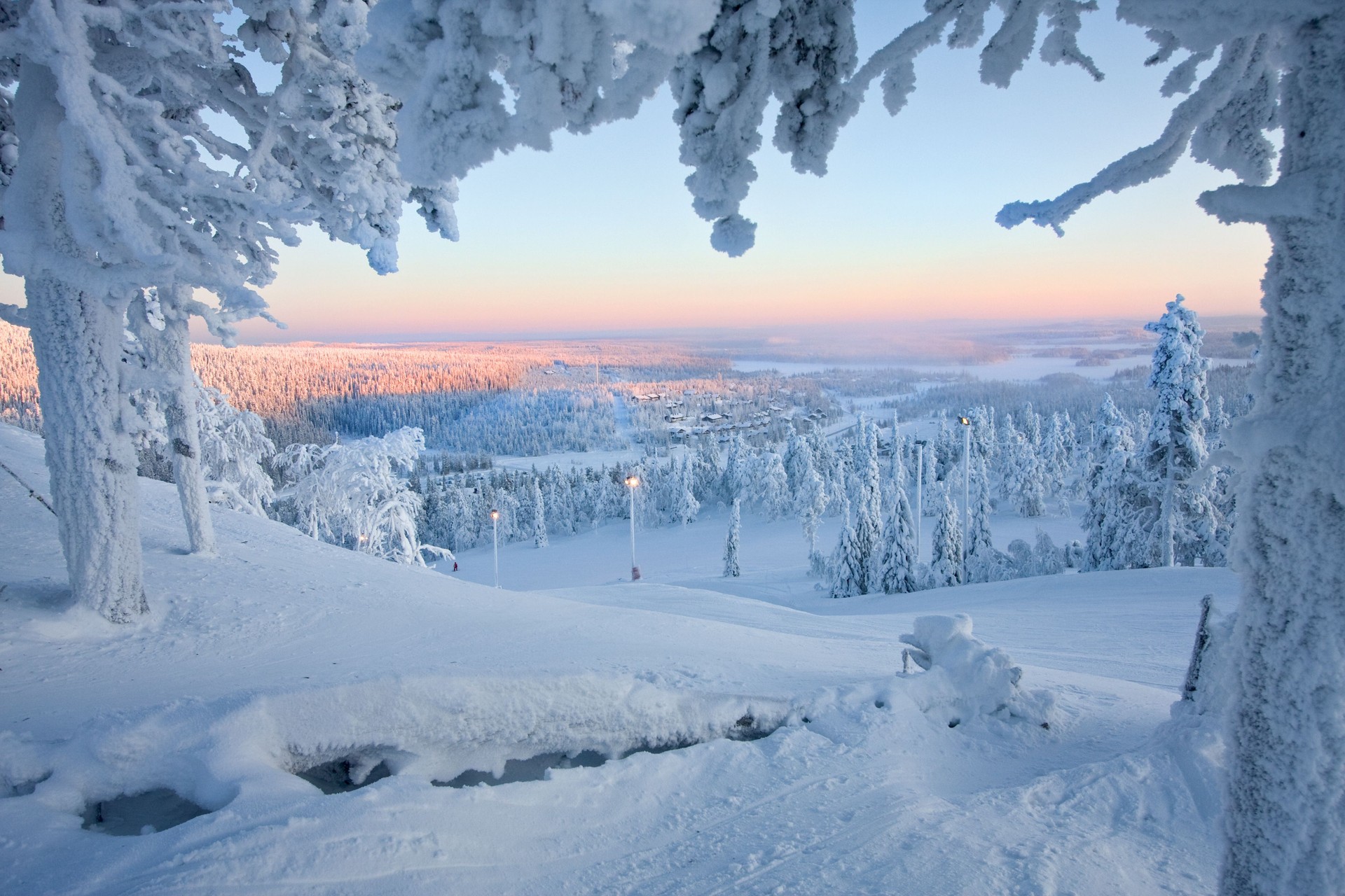 Frosty sunset at the frozen forest of Santa Claus